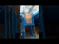 Cargo lift working in warehouse--XYZLIFT