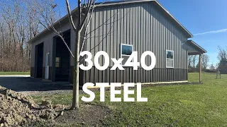 Take a tour of this 30x40 pole barn garage with taupe 29 gauge sidewall steel and brown wainscot