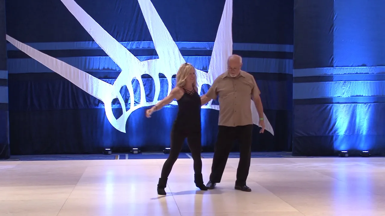 Liberty Swing 2018 Pro Am Spotlight Leader Michael Curren with Leslie Segebade