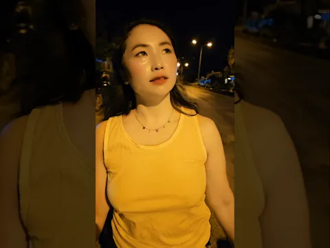 Mom is walking during the evening hours.
