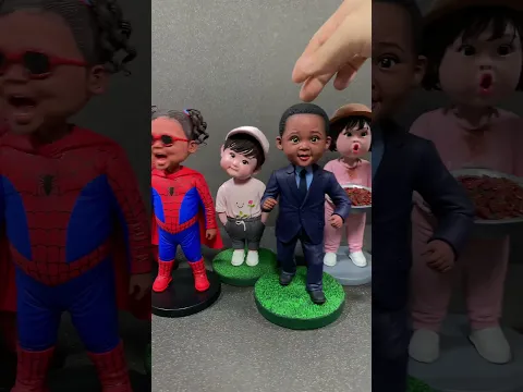 A handmade clay bobblehead party full of smiles.
