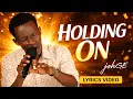 Lagu johGE - Holding On ( Official Lyrics Video )