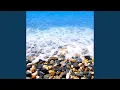 Gentle Waves on a Pebble Beach