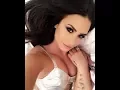 Demi Lovato unloads bare boobs in frontless top