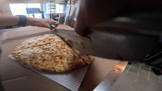 POV Slicing Pizzas Nonstop during Friday Rush Domino s