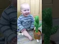 Cute Babies playing with Dancing Cactus