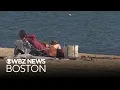 People get out and enjoy warm weather in Boston
