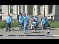 Senior citizens dance in flash mob