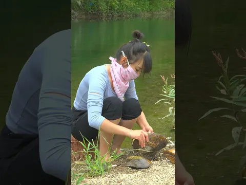 A fearless girl hunts pearls where dangerous snakes lurk in river depths