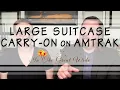 Can I take a LARGE SUITCASE on Amtrak if my train DOESN T do checked bags