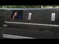 Villa Rica officer waves from limo as he is released from hospital