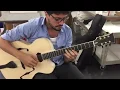 Pasquale Grasso playing an unfinished archtop Valle Guitar.