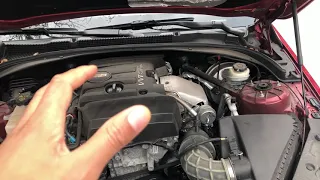 Cadillac ATS - Adding windshield washer fluid