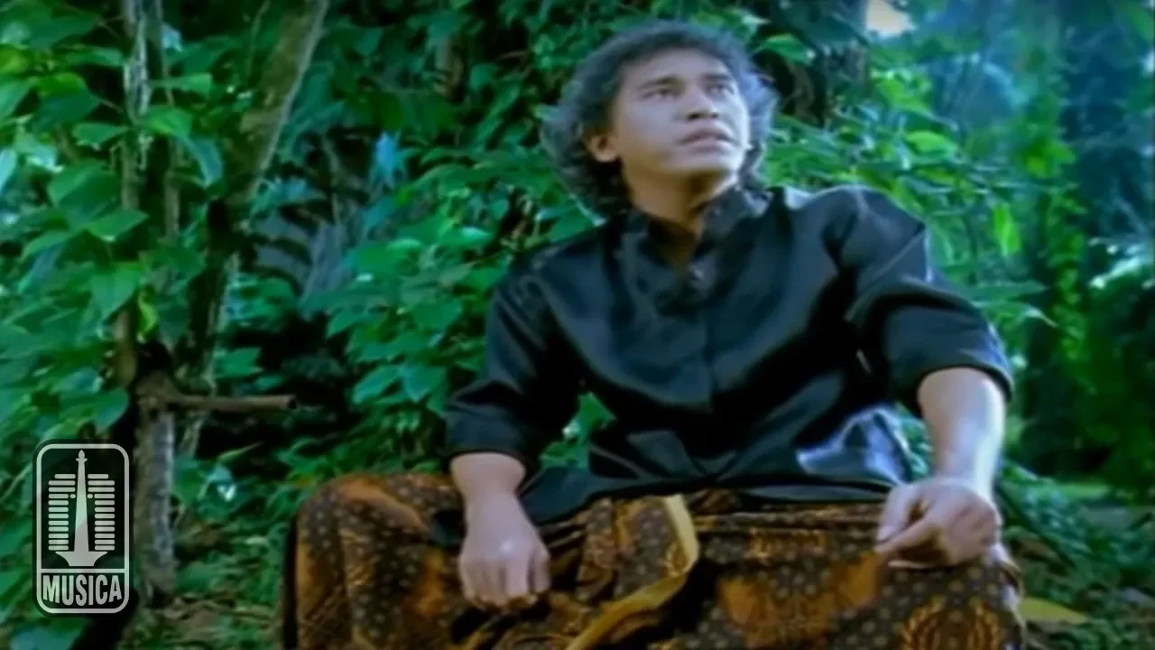 Iwan Fals - Kupu - Kupu Hitam Putih (Official Music Video)