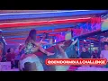 Brunette Girl in Colorful Dress Ride on Benidorm Mechanical Bull Bull Riding 4K