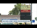 Machines money seized from Muskegon bar suspected of illegal gambling activity