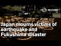 Ten years on Japan mourns victims of eart uake and Fukushima disaster
