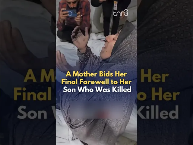 ⁣A mother bids farewell to her son after Israel killed eight of her children in an Israeli airstrike.