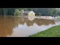 Children play in floodwater in Manchester, No. 1