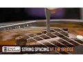 Setting guitar string spacing at the bridge