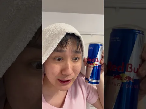Baby tries a red bull for the first time