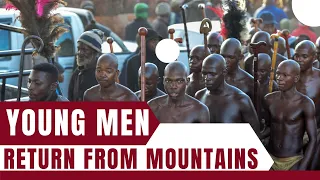 young men return from mountains
