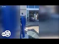 shows customer ramming car through CarMax in Inglewood