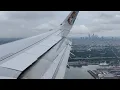 Frontier Airlines A321 cloudy landing gate arrival in Philadelphia PHL