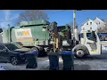 A Cranston Garbage Truck Packing Providence Trash