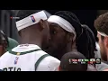 Giannis gets absolutely hacked by Montrezl Harrell and Bobby Portis immediately gets in Trez s face