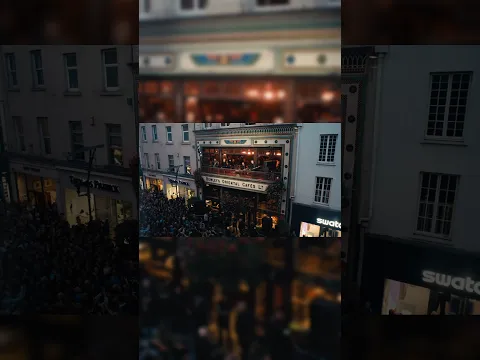 From a balcony over Grafton Street, “Silencio”.