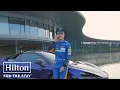 Lando Norris becomes a chauffeur for a Hilton Honors school run Hilton