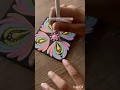 Brush strokes dot mandala on a square