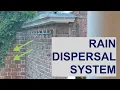 Rainhandler rain dispersal gutter system