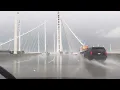 East on the Bay Bridge to Oakland Berkeley California in the rain