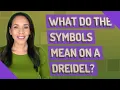 What do the symbols mean on a dreidel