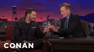Conan Presents Jamie Dornan His Razzie Award CONAN on TBS