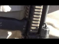 modified M4 carbine with EOTech reflex sight and frontal grip closeup