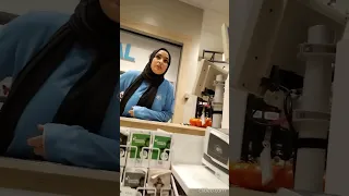 a beautiful muslim woman is trying to covertly look at my bulge