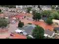 shows Hurricane streets flooded after morning storm