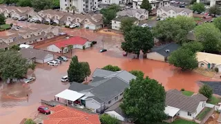 shows Hurricane streets flooded after morning storm