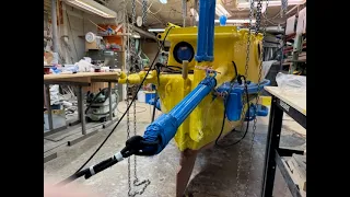 Handling the drouge chain, on the bomkin, from the hatch.