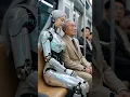 Friendly Humanoid Robot Sits with Elderly Man on Futuristic Subway #Robots #Robot