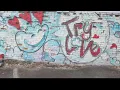 Local artist spreads positivity throughout Macon with graffiti