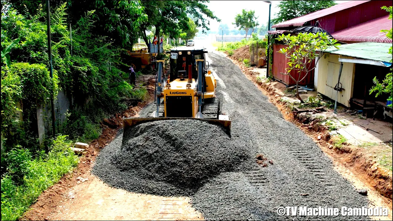 Amazing processing making foundation village road dozer pushing and dump truck spreading gravel