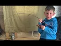 Download Lagu Young boy with an unreal knack for fishing bags a massive trout! || WooGlobe
