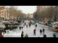 Skaters glide across frozen surfaces of Amsterdam canals