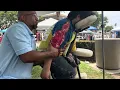 Massage Therapist Gives Massage At An Antique Flea Market
