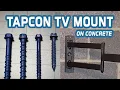 Tapcon TV Mount on Concrete Wall concrete screws in cinder block holding up a TV