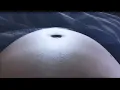 Upset Alien belly squirms and gurgles